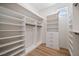 Bright walk-in closet with ample storage space including shelves and drawers, perfect for organization at 2742 Darby Falls Dr, Las Vegas, NV 89134