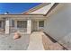 Cozy front porch with sitting area, decorative details, and covered entrance, great curb appeal at 2753 Trickling Brook Ct, Las Vegas, NV 89156