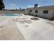 Spacious backyard with pool, and concrete patio area, ideal for outdoor activities at 2804 E Gowan Rd, North Las Vegas, NV 89030