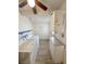 Laundry room equipped with washer, dryer, and storage cabinets, ready for convenience at 2804 E Gowan Rd, North Las Vegas, NV 89030