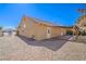 Home featuring a backyard with low-maintenance landscaping and a covered patio at 2809 Mountain Violet Ct, Las Vegas, NV 89108