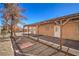 Spacious backyard with shade cover, gravel landscaping and mature trees at 2809 Mountain Violet Ct, Las Vegas, NV 89108