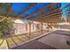 Large backyard with shade cover, low maintenance gravel landscaping and room to play at 2809 Mountain Violet Ct, Las Vegas, NV 89108