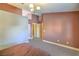 Carpeted bedroom featuring neutral walls, a ceiling light, and doorways leading to other rooms at 2809 Mountain Violet Ct, Las Vegas, NV 89108