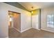 Inviting entryway with neutral walls, carpet, and a view into other rooms at 2809 Mountain Violet Ct, Las Vegas, NV 89108