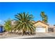 Charming single story home with mature palm tree landscaping and low maintenance desert scape at 2809 Mountain Violet Ct, Las Vegas, NV 89108