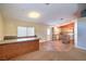 Open-concept space with tile floors, wooden cabinetry, and ample counter space at 2809 Mountain Violet Ct, Las Vegas, NV 89108