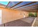 Enclosed patio with concrete floor and decorative wood deck is great for entertaining at 2809 Mountain Violet Ct, Las Vegas, NV 89108