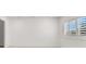 Bedroom featuring white shutters allowing natural light and carpeted flooring at 2873 Cambretto Dr, Henderson, NV 89074