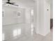 Bright bedroom with tile floors, white walls, and shuttered windows, offering a clean, modern aesthetic at 2873 Cambretto Dr, Henderson, NV 89074
