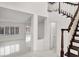 Bright foyer showcasing staircase and open floor plan at 2873 Cambretto Dr, Henderson, NV 89074