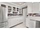 Spacious kitchen featuring white cabinetry and modern appliances at 2873 Cambretto Dr, Henderson, NV 89074