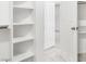 Walk-in closet with built-in shelving and bright lighting at 2873 Cambretto Dr, Henderson, NV 89074