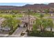 Aerial view of a landscaped home showcasing its well-maintained yard and neighborhood at 2933 Red Springs Dr, Las Vegas, NV 89135