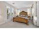 Bright bedroom with French doors, shutters, and elegant furnishings at 2933 Red Springs Dr, Las Vegas, NV 89135