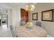 Bright dining area showcases a round marble table, seating for four, and views into the entry at 2933 Red Springs Dr, Las Vegas, NV 89135