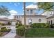Stunning home with beautiful landscaping, a well-manicured lawn, and a charming covered front entry at 2933 Red Springs Dr, Las Vegas, NV 89135