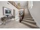 Grand entrance foyer showcasing a staircase, high ceilings, and elegant decor at 2933 Red Springs Dr, Las Vegas, NV 89135