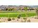 Panoramic view of a meticulously kept golf course and mountain range, perfect for outdoor enthusiasts at 2933 Red Springs Dr, Las Vegas, NV 89135