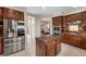 Spacious kitchen with an island, stainless steel appliances, and ample cabinet space at 2933 Red Springs Dr, Las Vegas, NV 89135