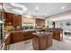 Gourmet kitchen with granite countertops, a center island, and stainless appliances at 2933 Red Springs Dr, Las Vegas, NV 89135