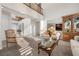 Bright, open living room with high ceilings, large windows, neutral color palette, and decorative furniture at 2933 Red Springs Dr, Las Vegas, NV 89135