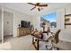 Office space with dual desks, natural light from the window, and ceiling fan at 2933 Red Springs Dr, Las Vegas, NV 89135