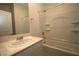 Bathroom features a shower and tub combination and modern vanity at 2970 Saltillo Ln, Las Vegas, NV 89121