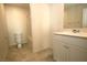 Clean bathroom with a single vanity, toilet, and shower-tub combination at 2970 Saltillo Ln, Las Vegas, NV 89121