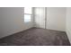 Simple bedroom featuring a window for natural light and a door for easy access at 2970 Saltillo Ln, Las Vegas, NV 89121