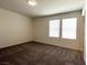 Comfortable bedroom with plush carpet and bright windows at 2970 Saltillo Ln, Las Vegas, NV 89121