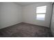 Cozy bedroom featuring soft carpet and a bright window at 2970 Saltillo Ln, Las Vegas, NV 89121