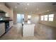 Kitchen with granite countertops, stainless steel appliances and tiled floors at 2970 Saltillo Ln, Las Vegas, NV 89121