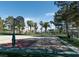 Community basketball court surrounded by lush landscaping at 3008 Blue Fin Cir, Las Vegas, NV 89128