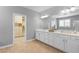 Bathroom with double sinks, lots of counter space, and a separate shower and tub at 3042 Echoed Rondel Ln, Henderson, NV 89044