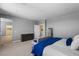 Spacious bedroom with carpet and access to a walk in closet and laundry at 3042 Echoed Rondel Ln, Henderson, NV 89044