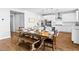 View of the dining area looking toward the kitchen, showcasing the open floor plan at 3042 Echoed Rondel Ln, Henderson, NV 89044