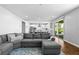 Open living space with access to the backyard, the kitchen, and dining area at 3042 Echoed Rondel Ln, Henderson, NV 89044