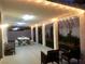 Large covered patio with ample seating offers a relaxing outdoor living area, perfect for gatherings at 3329 Hidden Ridge St, Las Vegas, NV 89129