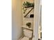 Cozy bathroom featuring decorative shelving and charming plants at 3329 Hidden Ridge St, Las Vegas, NV 89129