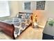 Bedroom with a comfortable bed and stylish decorative accents at 3329 Hidden Ridge St, Las Vegas, NV 89129