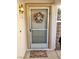 Welcoming front entrance featuring a decorative wreath and 'Welcome' mat at 3329 Hidden Ridge St, Las Vegas, NV 89129