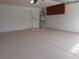 Spacious garage with epoxy flooring and installed cabinets offering tons of storage space at 3329 Hidden Ridge St, Las Vegas, NV 89129