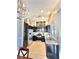 Well-appointed kitchen with stainless steel appliances, dark cabinets, and granite countertops at 3329 Hidden Ridge St, Las Vegas, NV 89129