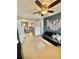Cozy living room with tiled floors, a stylish sofa, and decorative wall art at 3329 Hidden Ridge St, Las Vegas, NV 89129