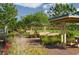 Picturesque community park with shaded picnic areas and lush landscaping at 3430 Oristano Ln, Henderson, NV 89044