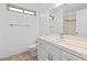 Cozy bathroom with tiled floor and a neutral color countertop and a well-lit mirror at 356 Clark Dr, Henderson, NV 89074