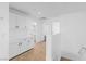 Bright hallway with built-in white cabinets for extra storage space on the second floor at 356 Clark Dr, Henderson, NV 89074