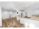 Open concept kitchen with modern appliances, granite countertops, and backyard access at 356 Clark Dr, Henderson, NV 89074