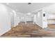 Bright and open living space with stylish wood-look flooring and neutral decor at 356 Clark Dr, Henderson, NV 89074
